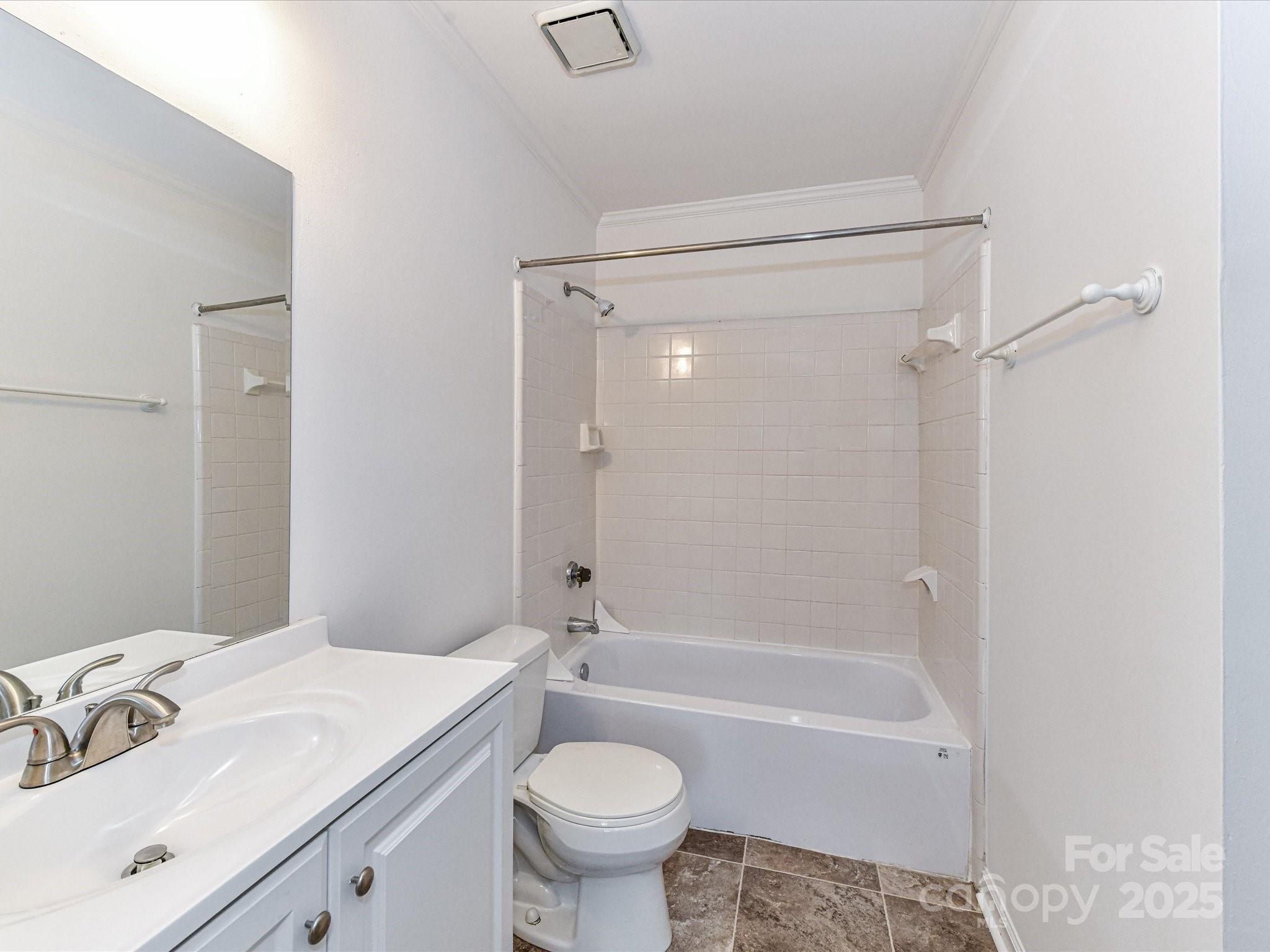 11020 Carmel Crossing Road Charlotte, NC 28226 - Photo 23 of 30 a bathroom with a sink toilet and shower