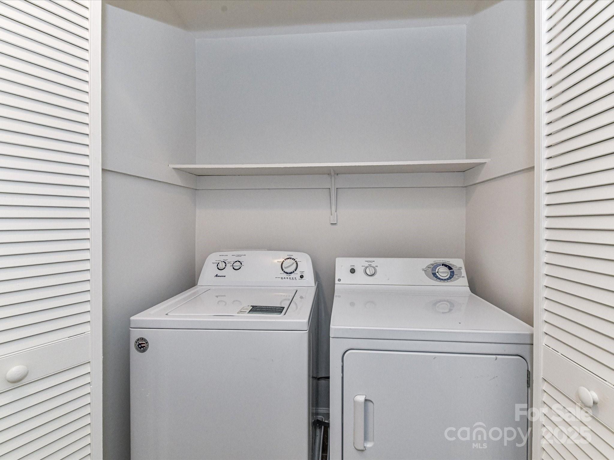11020 Carmel Crossing Road Charlotte, NC 28226 - Photo 27 of 30 a utility room with dryer and washer