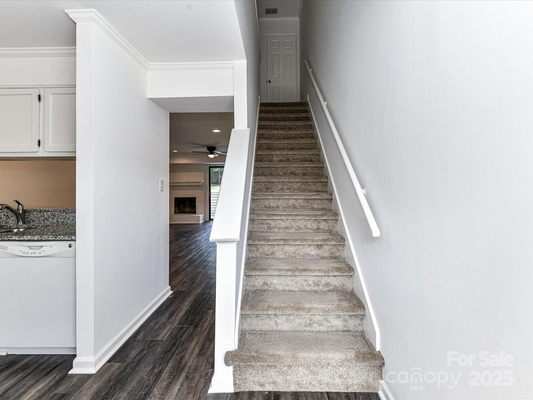 11020 Carmel Crossing Road Charlotte, NC 28226 - Photo 5 of 30 a view of entryway and hall with wooden floor