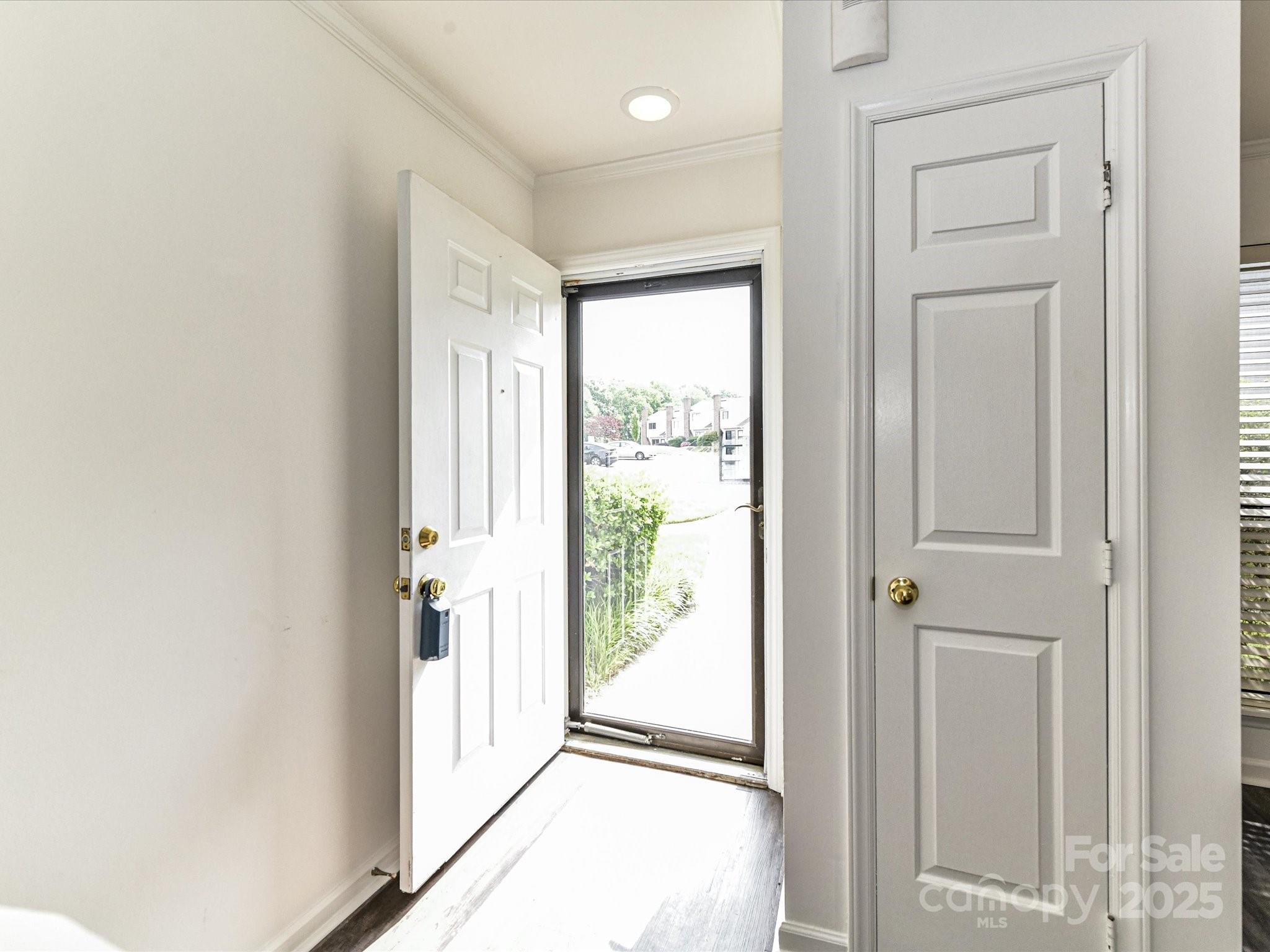 11020 Carmel Crossing Road Charlotte, NC 28226 - Photo 7 of 30 a view of a hallway with a outdoor space