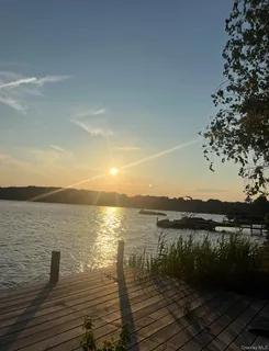 a view of ocean with sunset