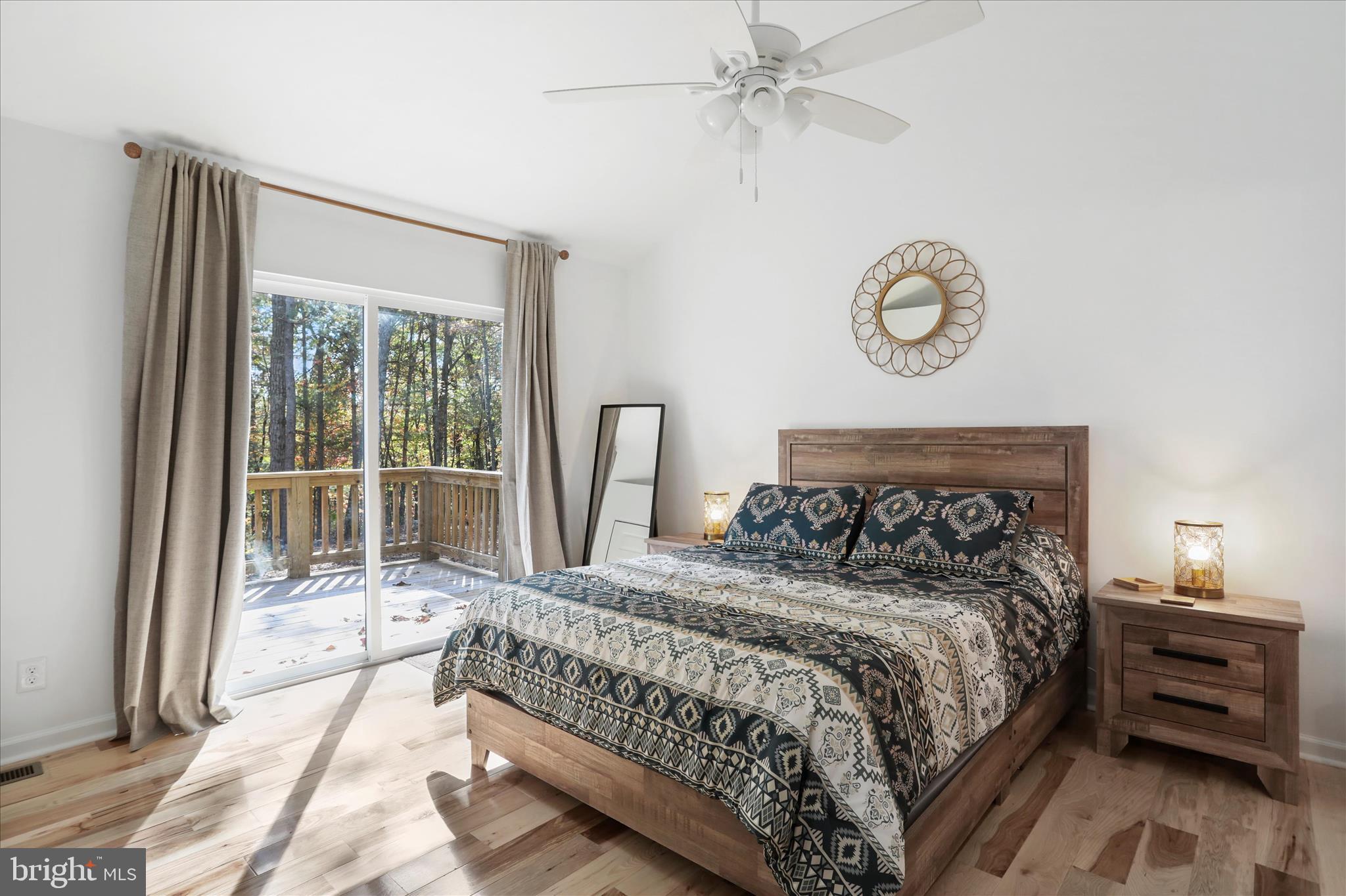 598 Crabapple Road Mount Jackson, VA 22842 - Photo 9 of 32 a bedroom with a bed and a window
