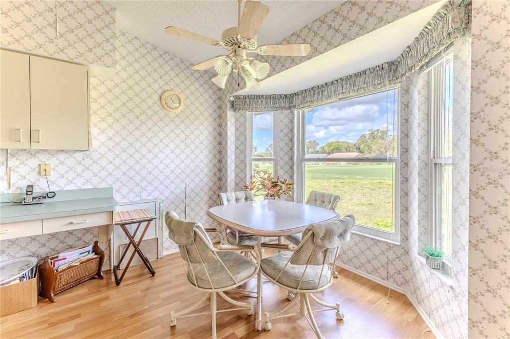 2420 Rolling View Drive Spring Hill, FL 34606 - Photo 18 of 62 a dining room with furniture and window