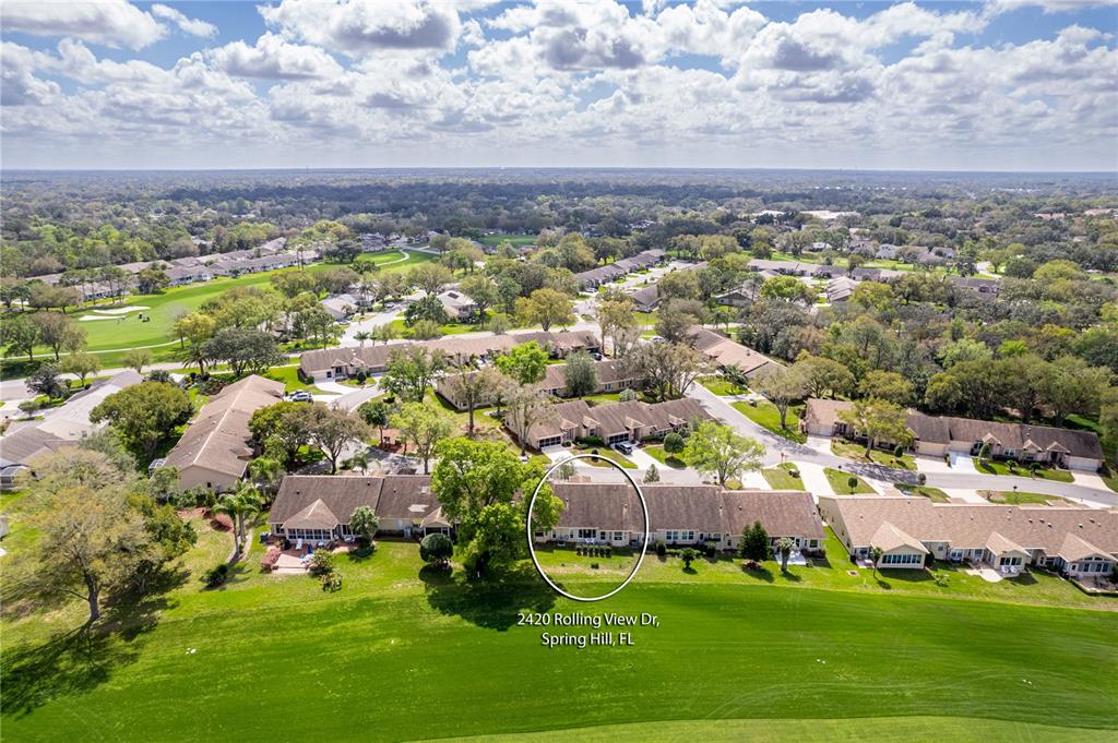 2420 Rolling View Drive Spring Hill, FL 34606 - Photo 45 of 62 an aerial view of multiple house