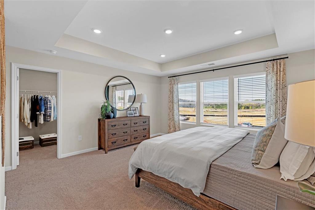 117 Lavender Circle Calhoun, GA 30701 - Photo 19 of 29 a bed room with a bed and a dresser