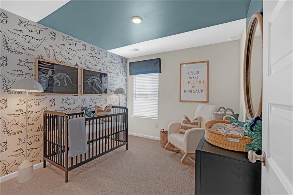 117 Lavender Circle Calhoun, GA 30701 - Photo 24 of 29 a bedroom with furniture and flat screen tv