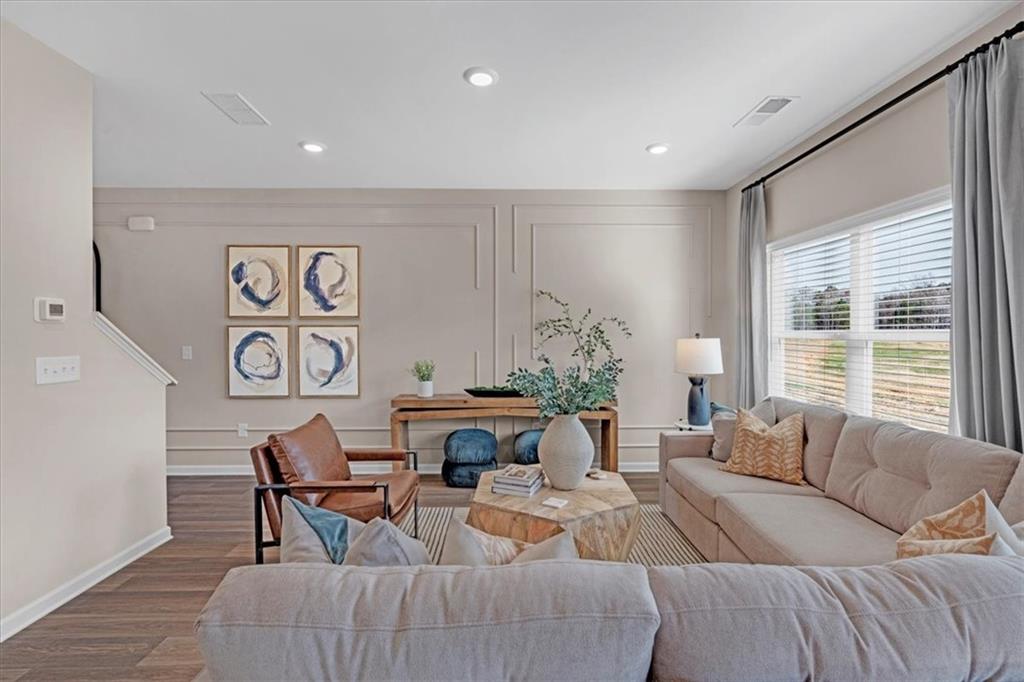 117 Lavender Circle Calhoun, GA 30701 - Photo 8 of 29 a living room with furniture and a large window