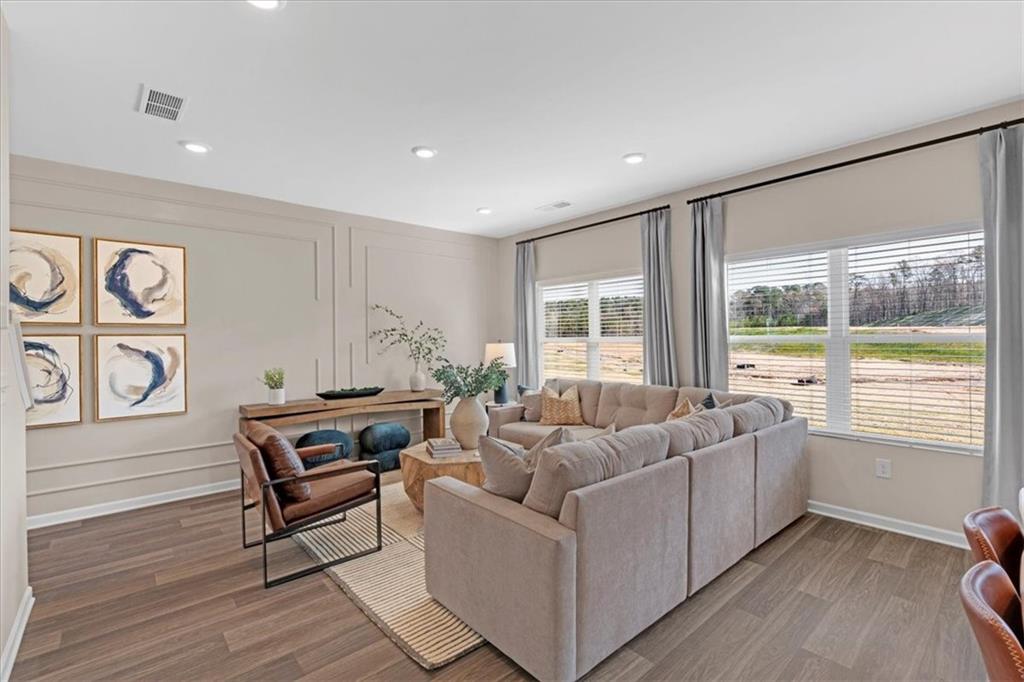 117 Lavender Circle Calhoun, GA 30701 - Photo 9 of 29 a living room with furniture and a large window