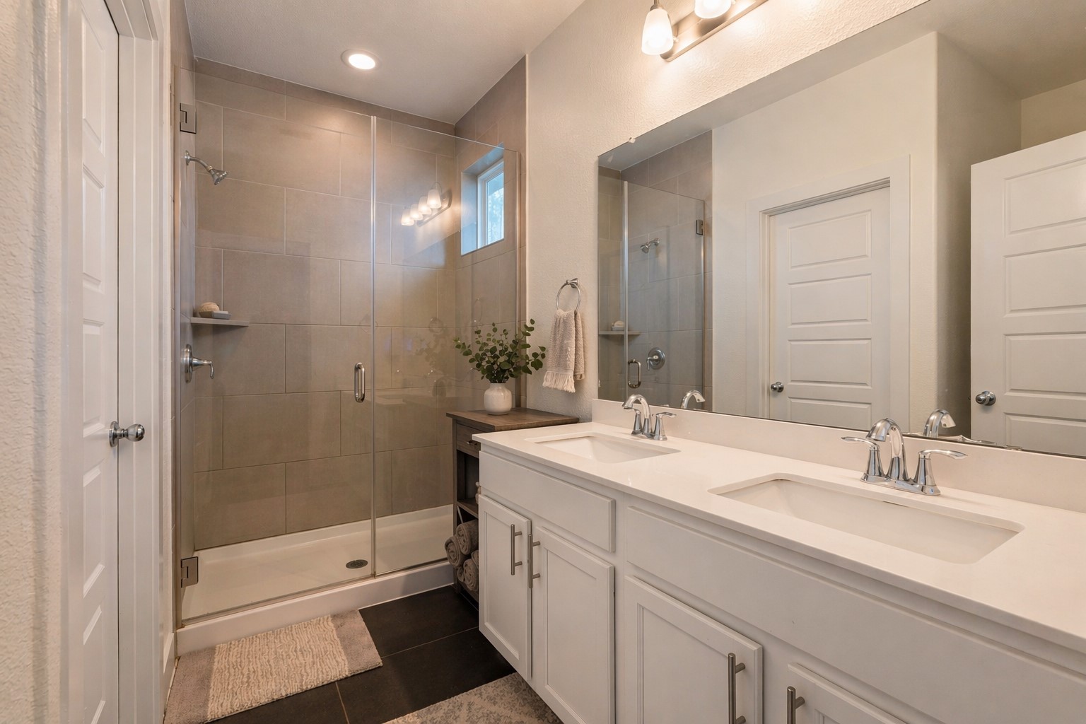 2100 Hermia Street, Unit 41 Austin, TX 78741 - Photo 12 of 22 a bathroom with a shower sink and mirror