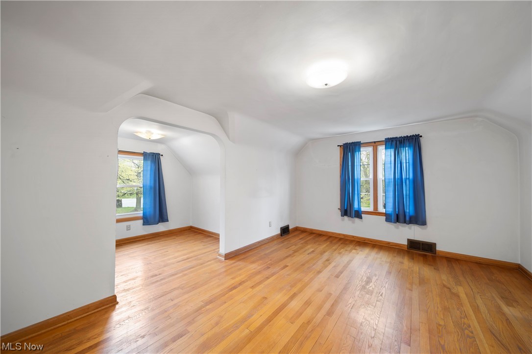 6835 Lake Road East Madison, OH 44057 - Photo 8 of 25 2nd floor bedroom 4- 19 x 16 includes cozy nook. Hardwood flooring.