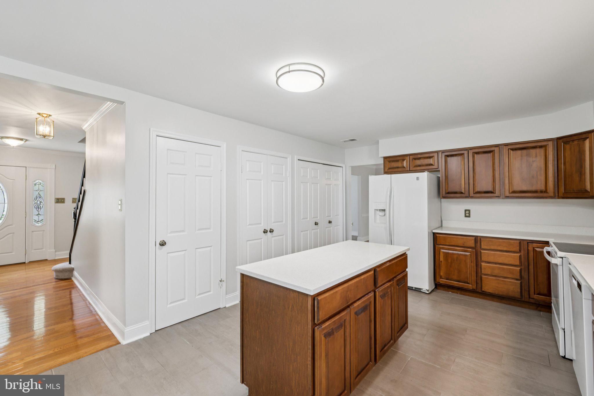 10700 Game Preserve Road Gaithersburg, MD 20879 - Photo 14 of 63 Modern kitchen with warm wood accents.