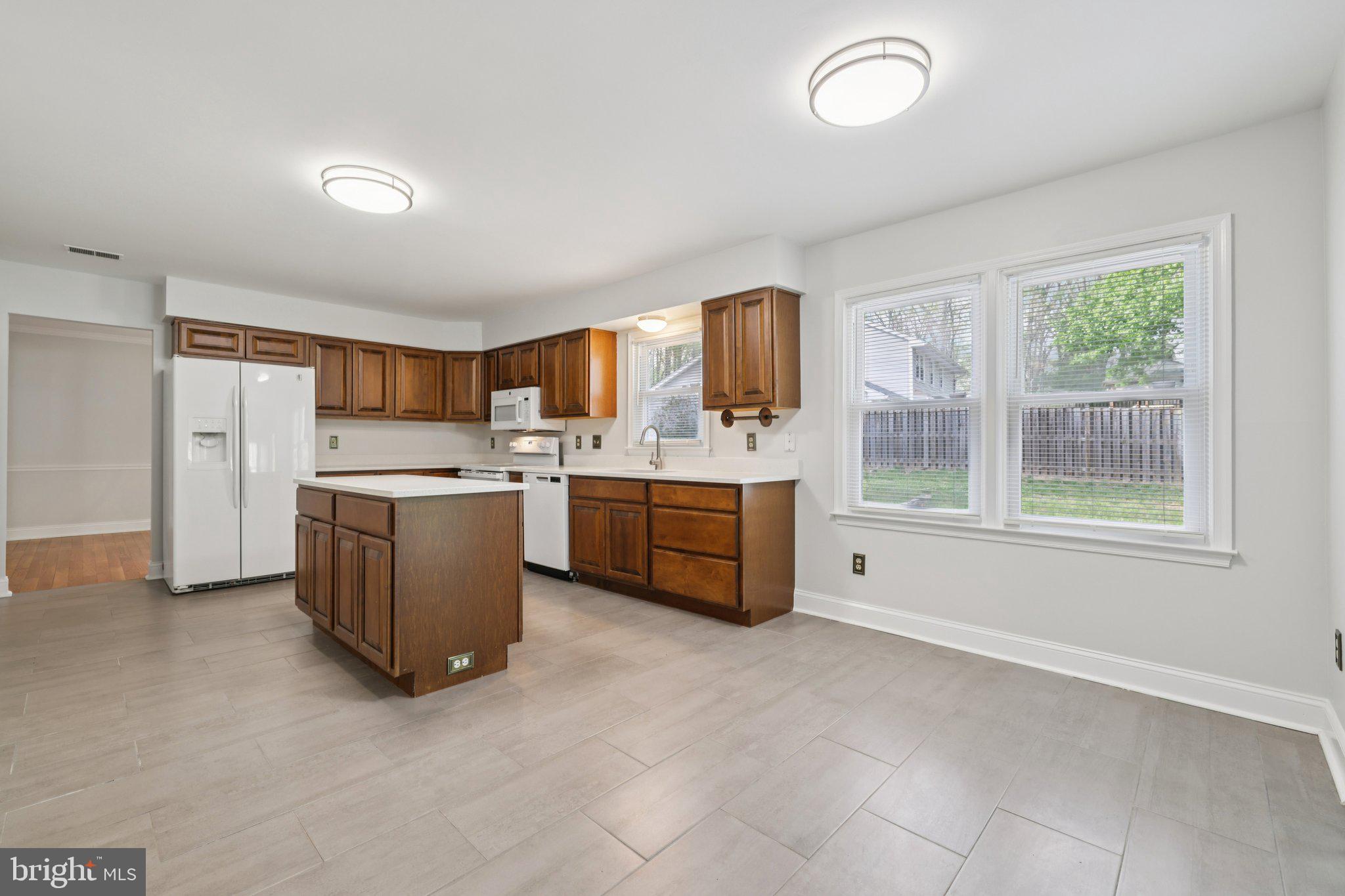 10700 Game Preserve Road Gaithersburg, MD 20879 - Photo 16 of 63 Bright and spacious kitchen dining oasis.