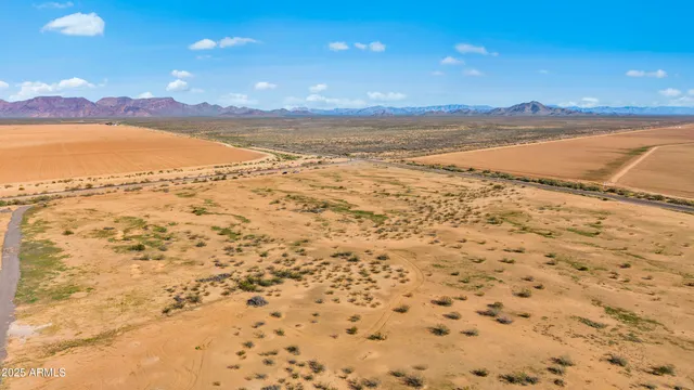 a view of an ocean and a mountain