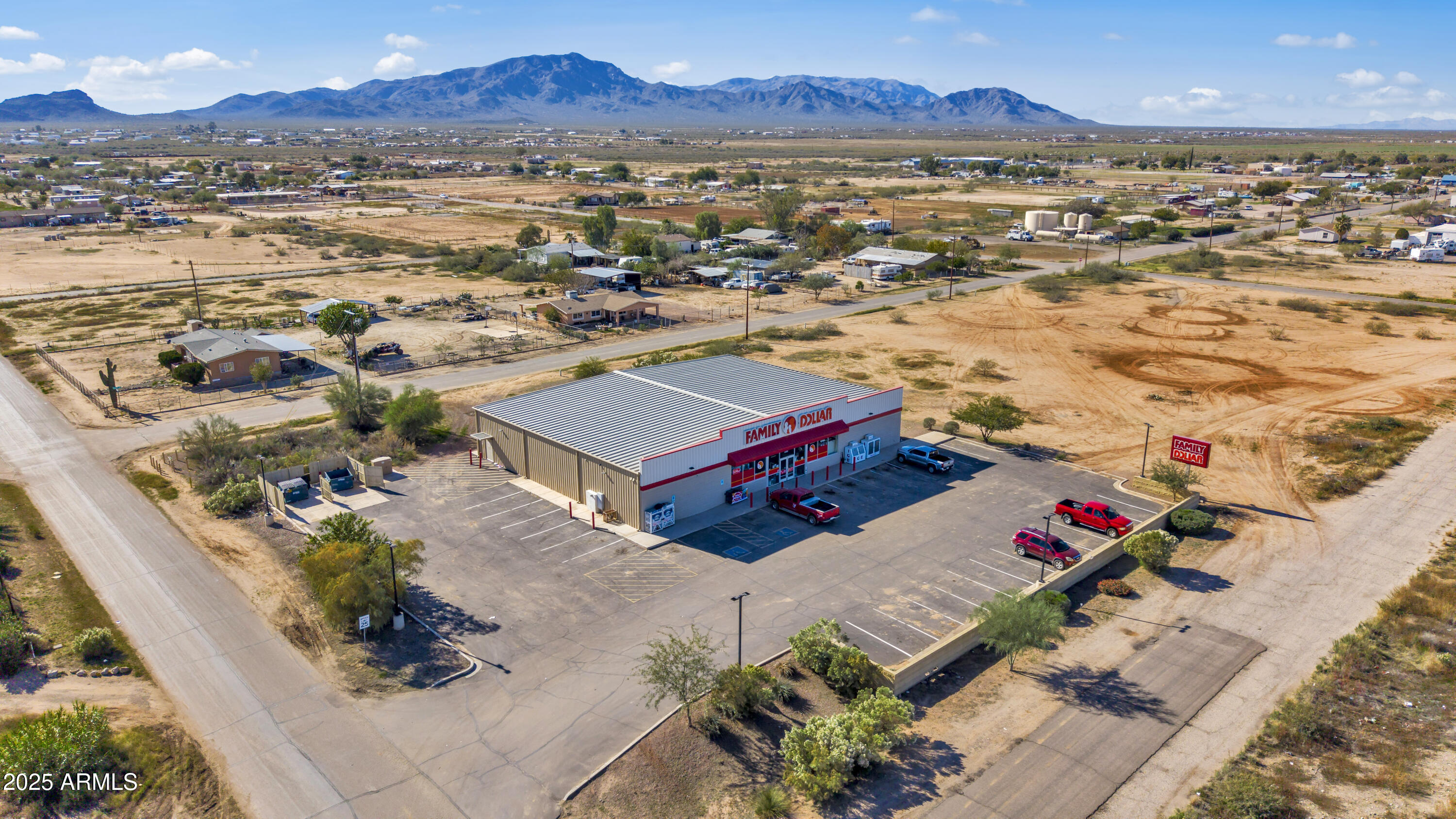 0 West Valley Road, Unit 1 Aguila, AZ 85320 - Photo 5 of 7 an aerial view of residential houses with outdoor space