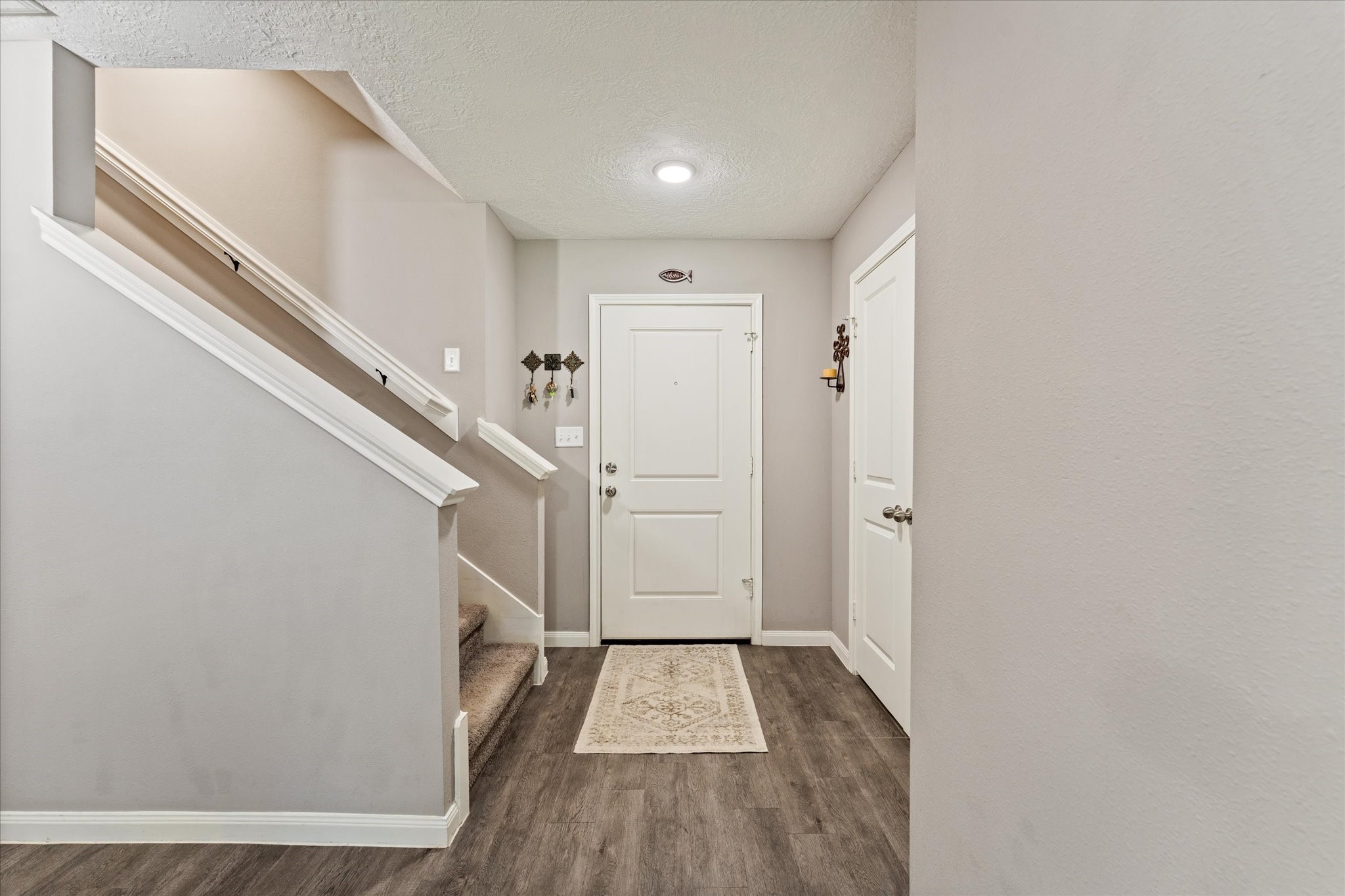 3998 Frontier Road Willis, TX 77378 - Photo 14 of 33 a view of entryway with wooden floor