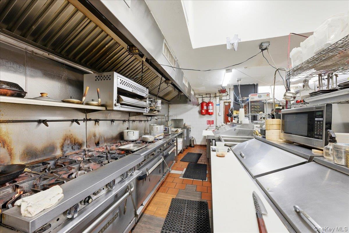 1435 2nd Avenue Manhattan, NY 10021 - Photo 14 of 33 a kitchen with lots of counter top space
