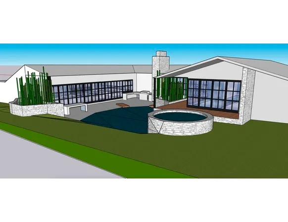 a living room with a bed and a book shelf