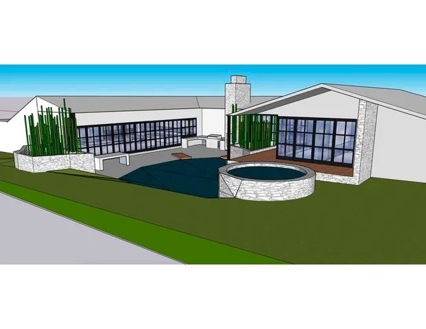 a living room with a bed and a book shelf