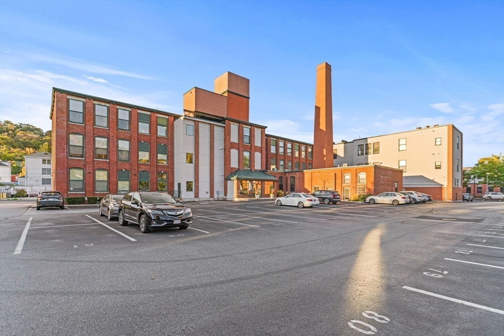 1 Envelope Terrace, Unit 110 Worcester, MA 01604 - Photo 14 of 15 a car parked on the side of a street