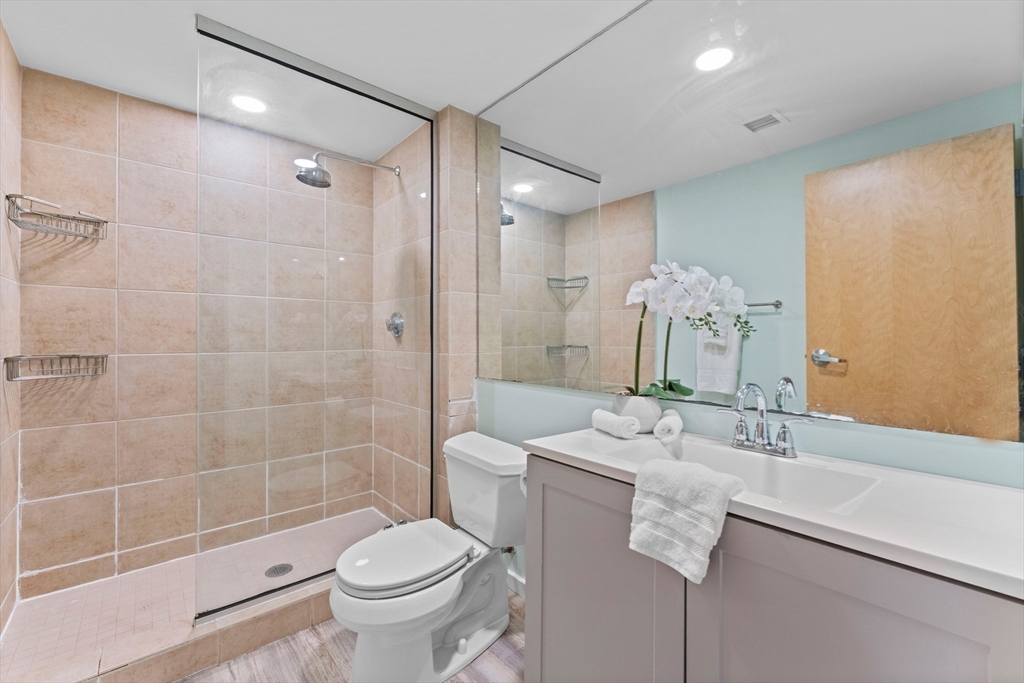 1 Envelope Terrace, Unit 110 Worcester, MA 01604 - Photo 8 of 15 a bathroom with a sink toilet tub and shower