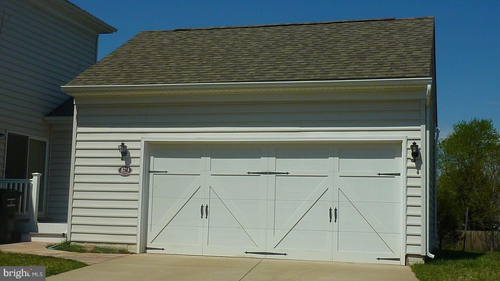 8719 Libeau Drive Manassas, VA 20110 - Photo 2 of 6 Attached garage located in rear of home