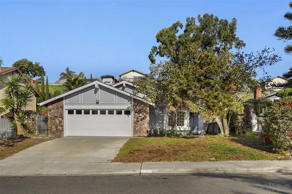 439 Mainsail Road Oceanside, CA 92054 - Photo 1 of 25 a front view of a house with a yard