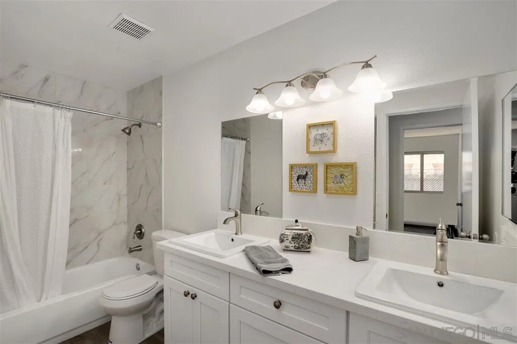 439 Mainsail Road Oceanside, CA 92054 - Photo 19 of 25 a bathroom with a sink toilet and shower