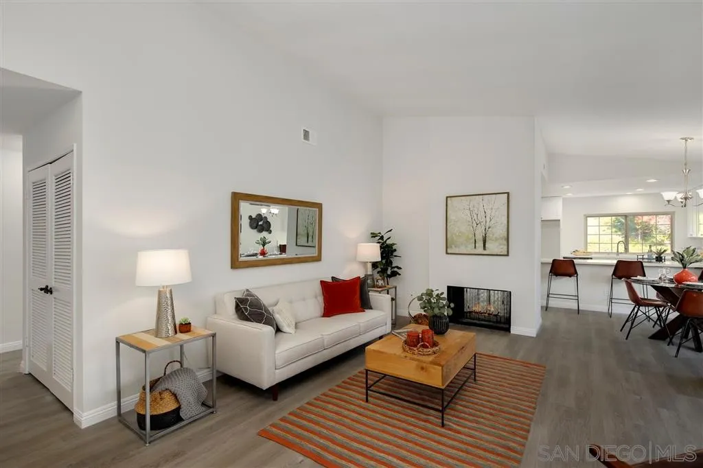 439 Mainsail Road Oceanside, CA 92054 - Photo 2 of 25 a living room with furniture and a wooden floor