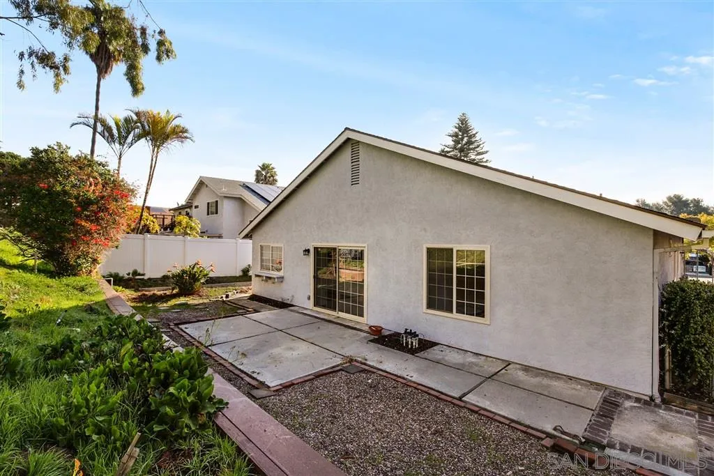 439 Mainsail Road Oceanside, CA 92054 - Photo 22 of 25 a backyard of a house with seating space
