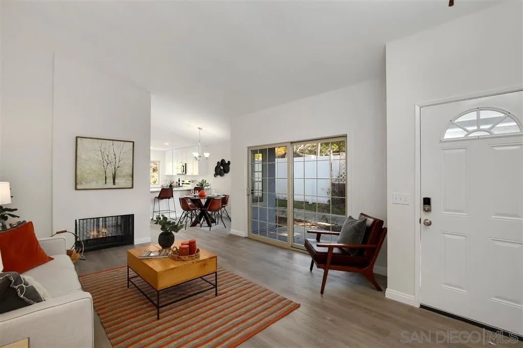 439 Mainsail Road Oceanside, CA 92054 - Photo 3 of 25 a living room with furniture and wooden floor