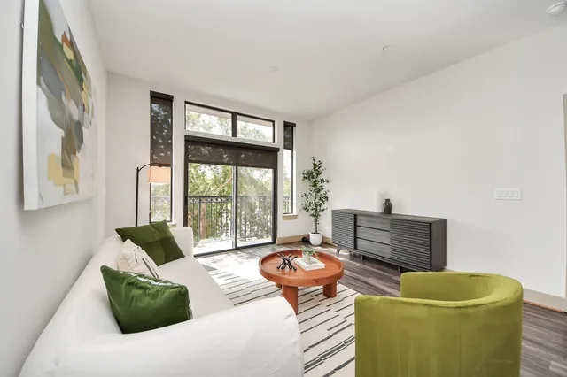 a swimming pool with outdoor seating and yard