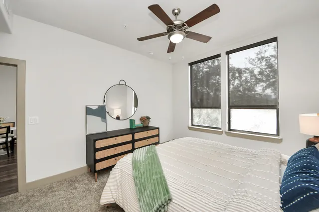 a view of a building with potted plants