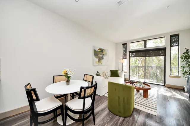 a bathroom with a shower and a sink