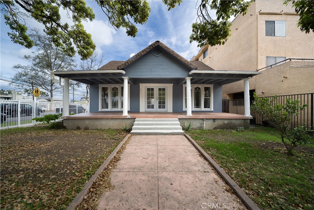 a front view of a house with yard