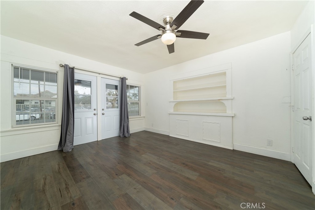 201 South Orange Avenue Santa Ana, CA 92701 - Photo 3 of 6 wooden floor in an empty room with a window