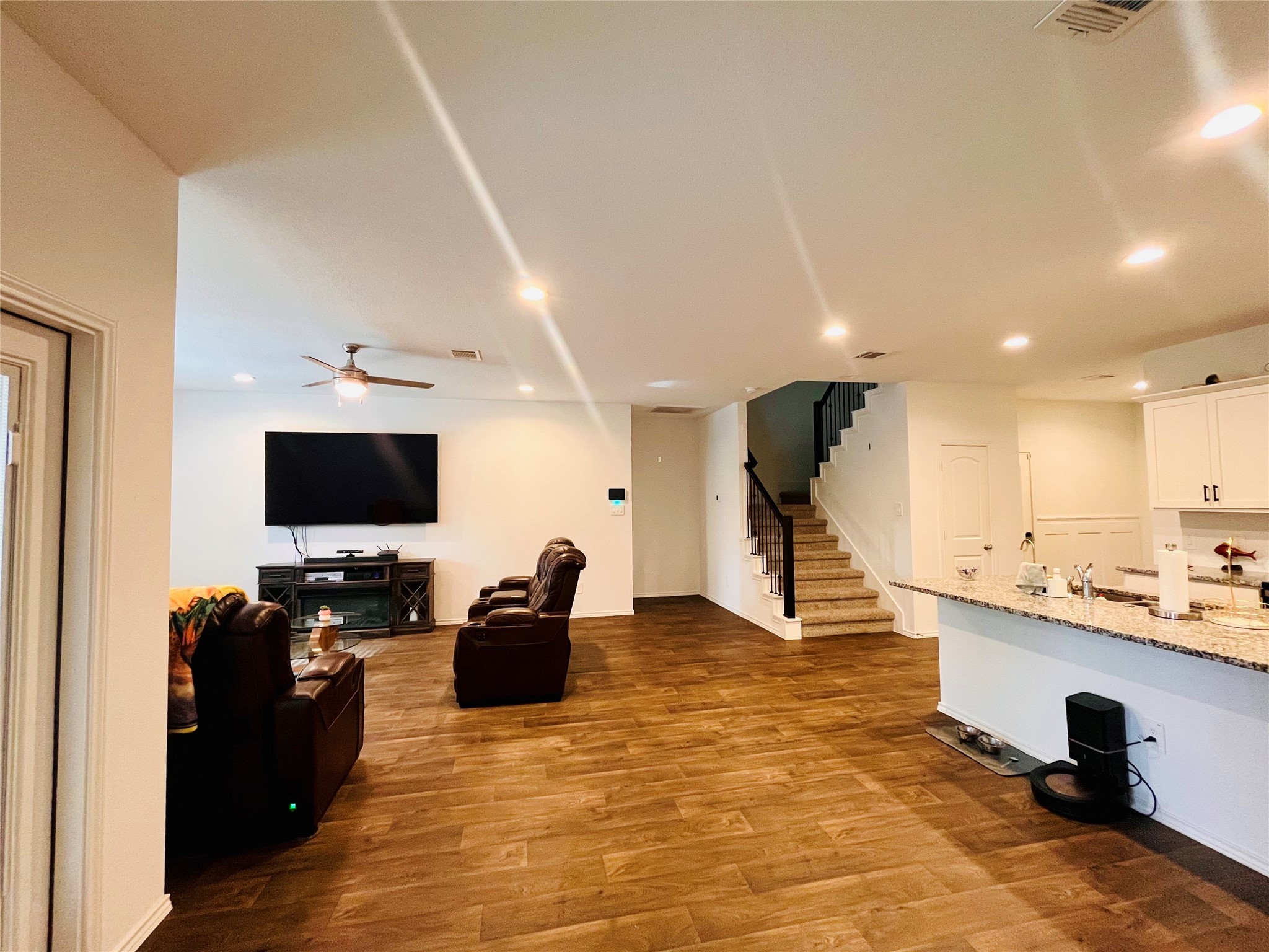 2914 Roman Forest Boulevard New Caney, TX 77357 - Photo 17 of 35 a living room with furniture and a flat screen tv