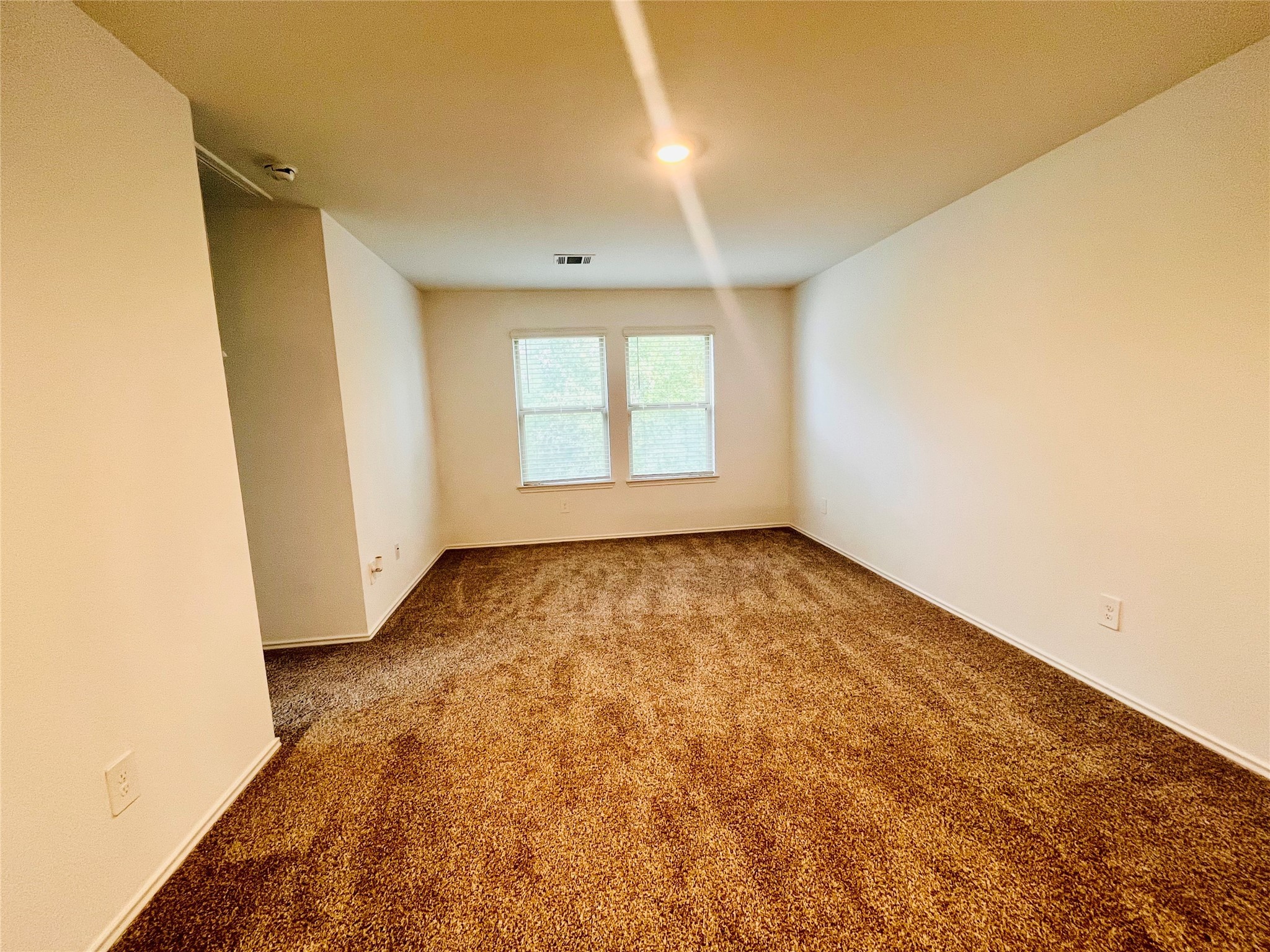 2914 Roman Forest Boulevard New Caney, TX 77357 - Photo 34 of 35 an empty room with a window