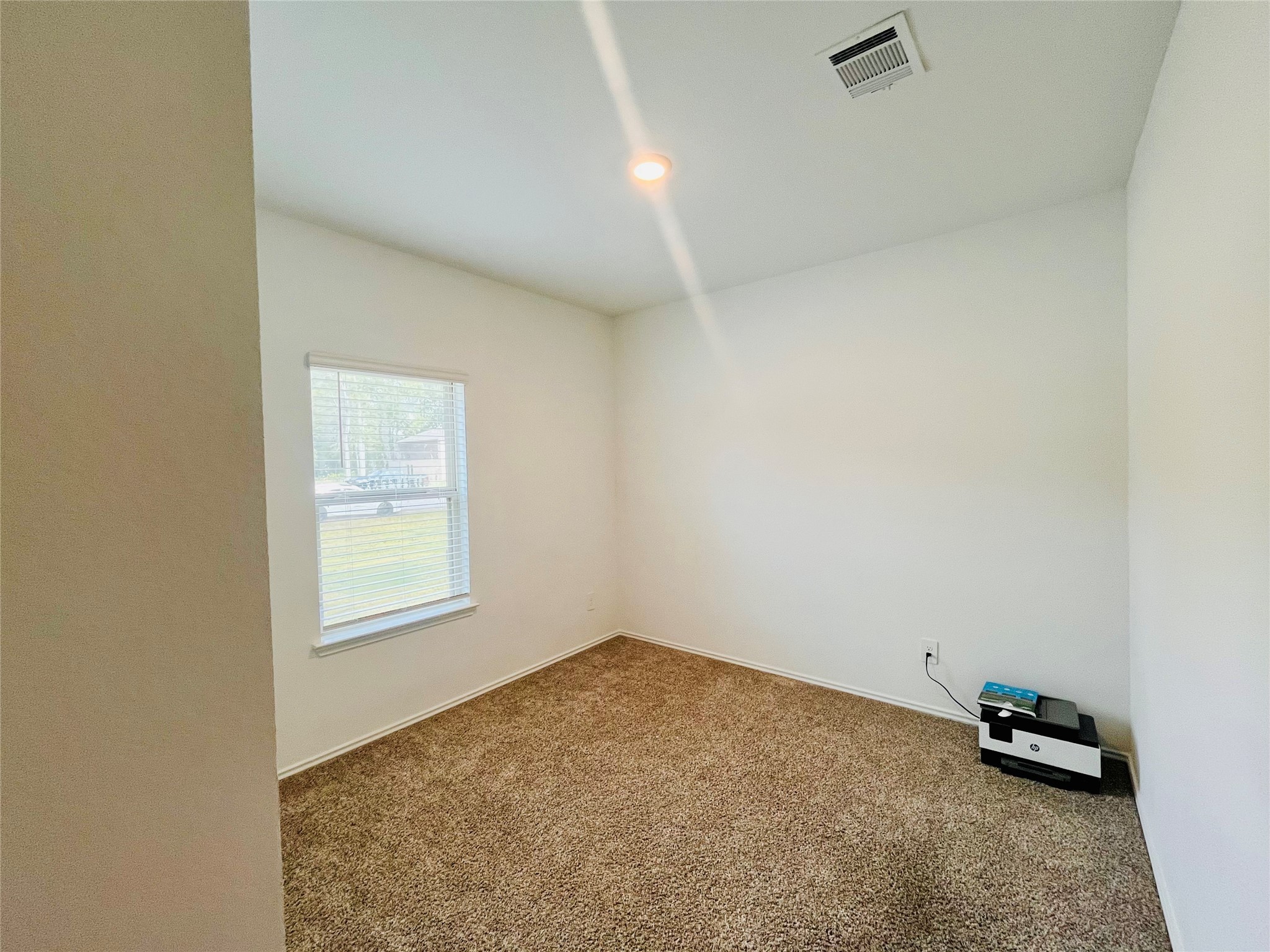 2914 Roman Forest Boulevard New Caney, TX 77357 - Photo 35 of 35 an empty room with a window