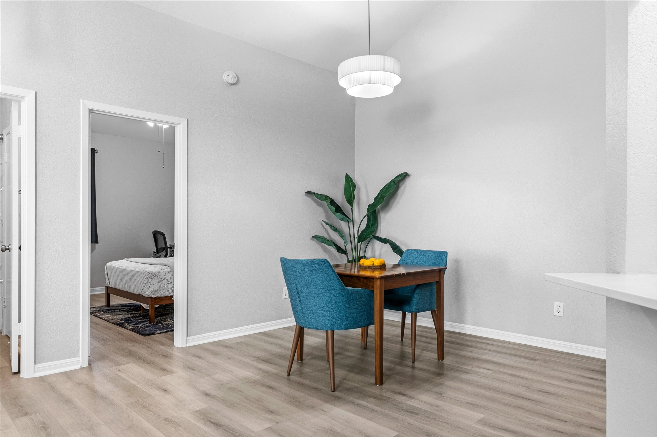 6501 Brush Country Road, Unit 137 Austin, TX 78749 - Photo 12 of 34 a workspace with furniture and wooden floor