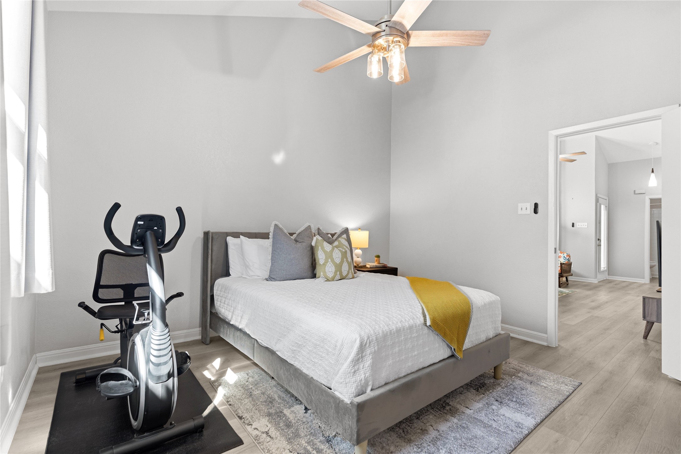6501 Brush Country Road, Unit 137 Austin, TX 78749 - Photo 18 of 34 a bedroom with a bed and chandelier