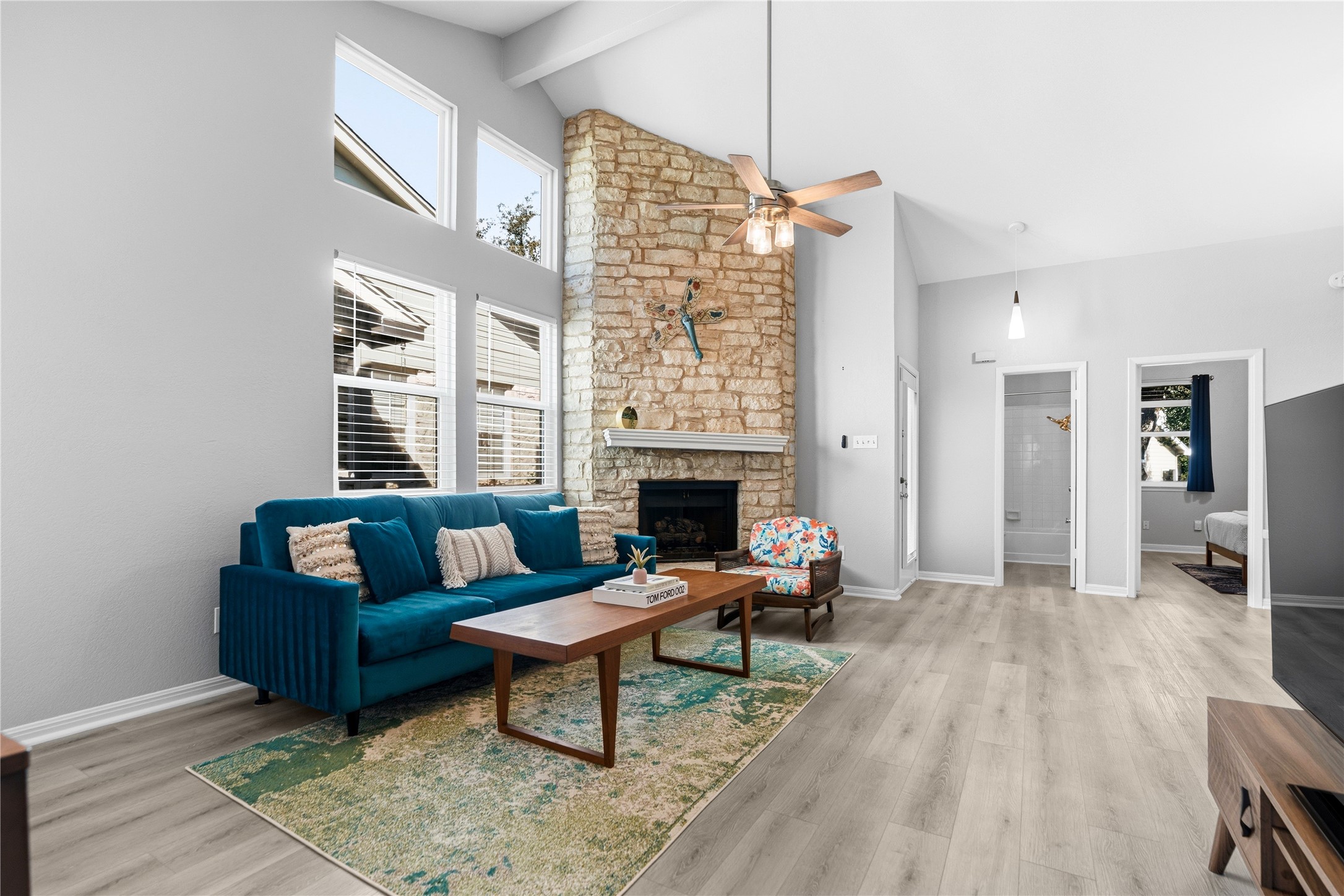 6501 Brush Country Road, Unit 137 Austin, TX 78749 - Photo 23 of 34 a living room with furniture and a fireplace