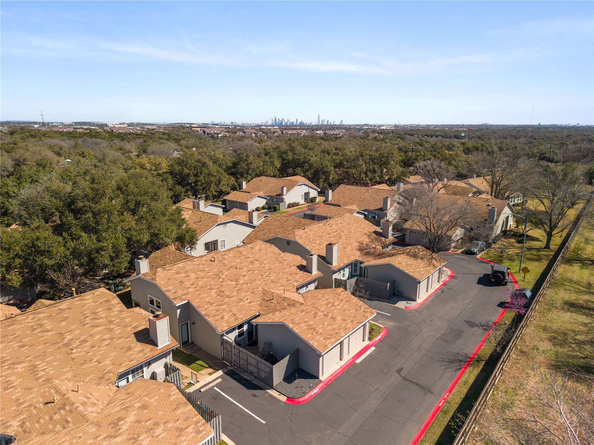 6501 Brush Country Road, Unit 137 Austin, TX 78749 - Photo 34 of 34 an aerial view of a house with swimming pool and mountains