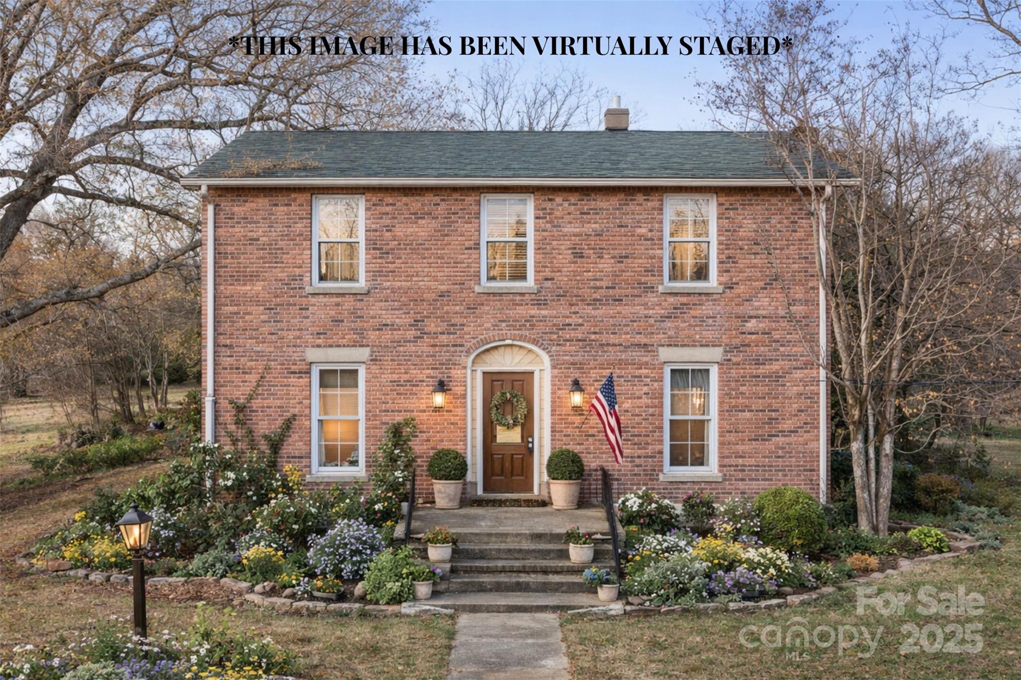 a front view of a house with garden