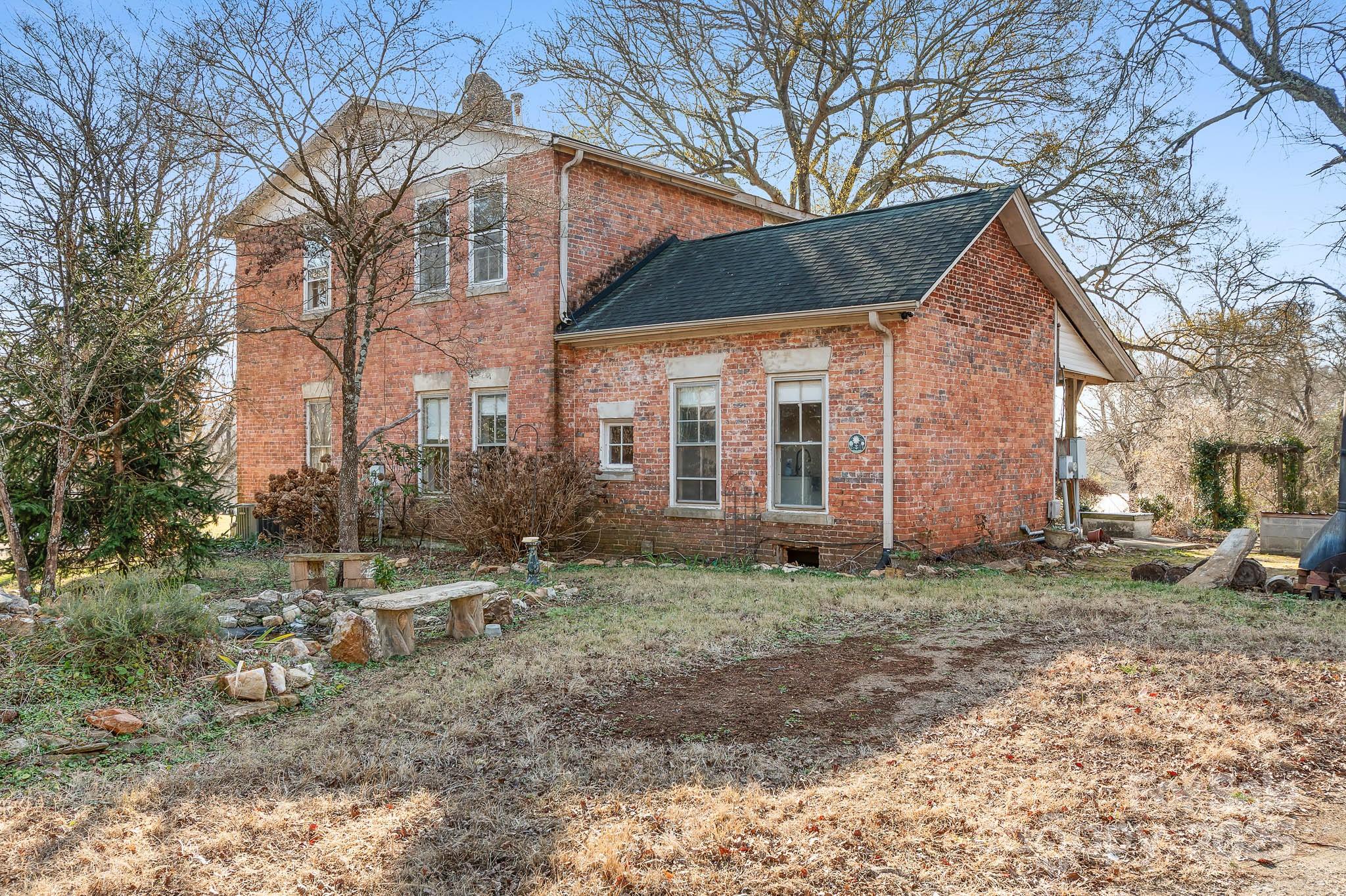 787 Startown Road Lincolnton, NC 28092 - Photo 14 of 33 a backyard of a house with outdoor seating