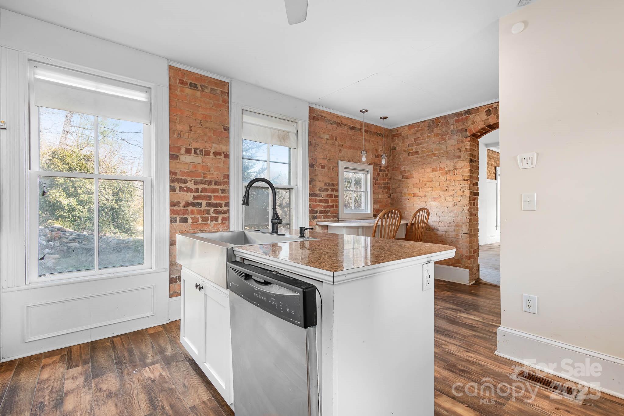 787 Startown Road Lincolnton, NC 28092 - Photo 15 of 33 a kitchen with a sink and a window