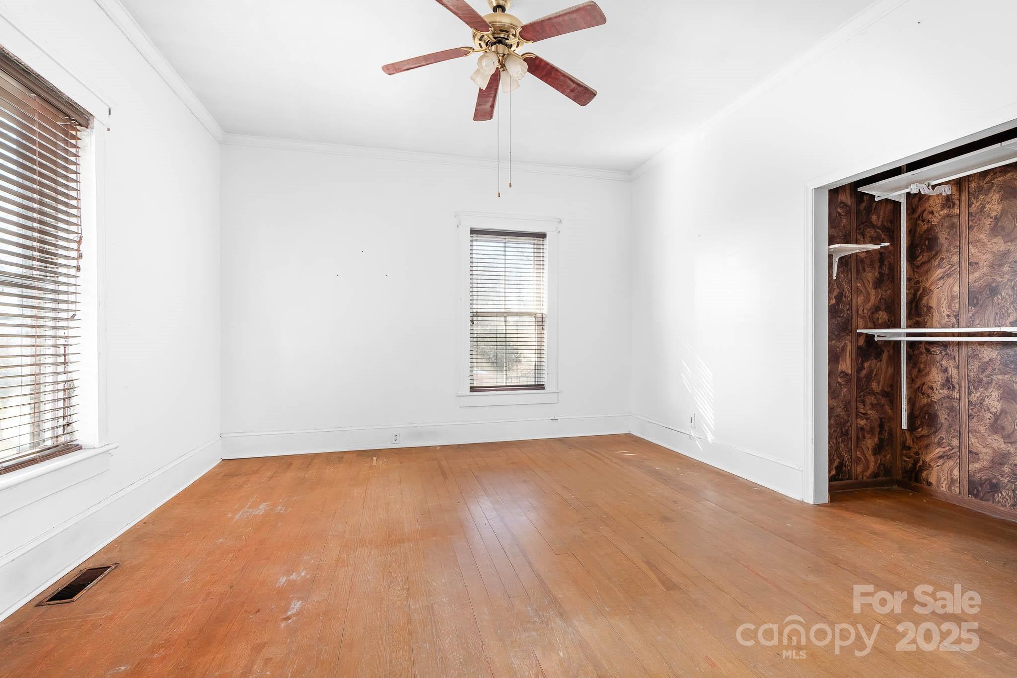 787 Startown Road Lincolnton, NC 28092 - Photo 20 of 33 a view of a room with a ceiling fan and a window