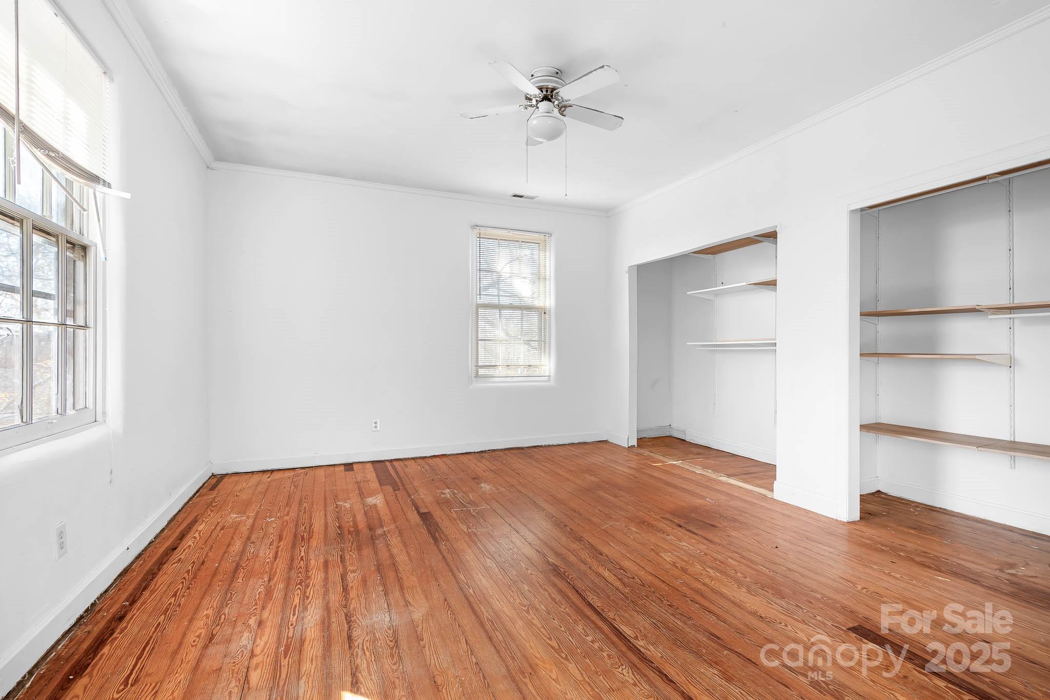 787 Startown Road Lincolnton, NC 28092 - Photo 24 of 33 a view of empty room with a window and wooden floor