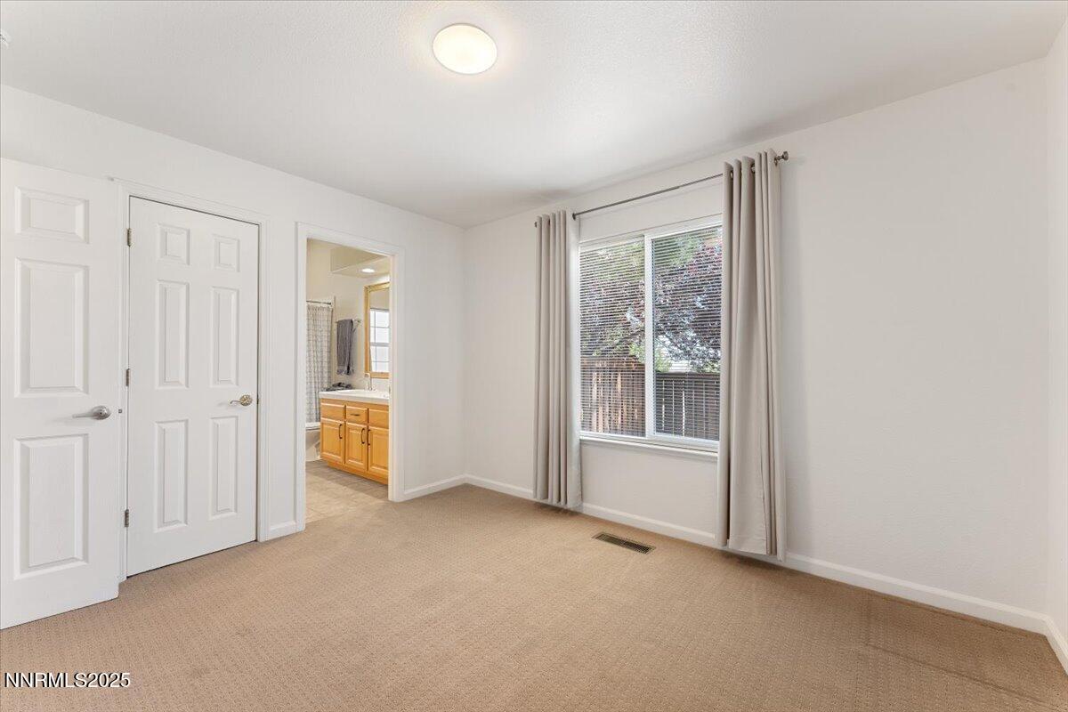 5024 East Albuquerque Road Reno, NV 89511 - Photo 19 of 27 an empty room with windows