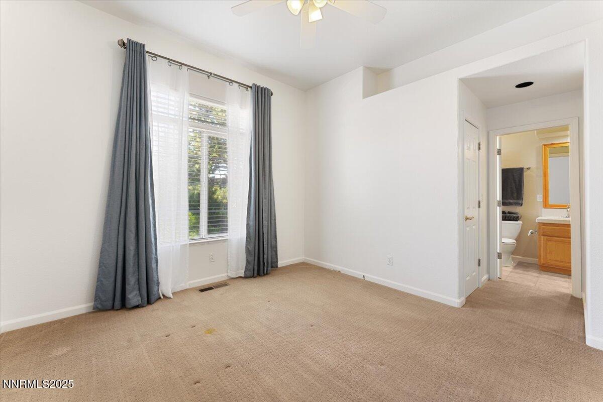 5024 East Albuquerque Road Reno, NV 89511 - Photo 21 of 27 a view of an empty room with a window