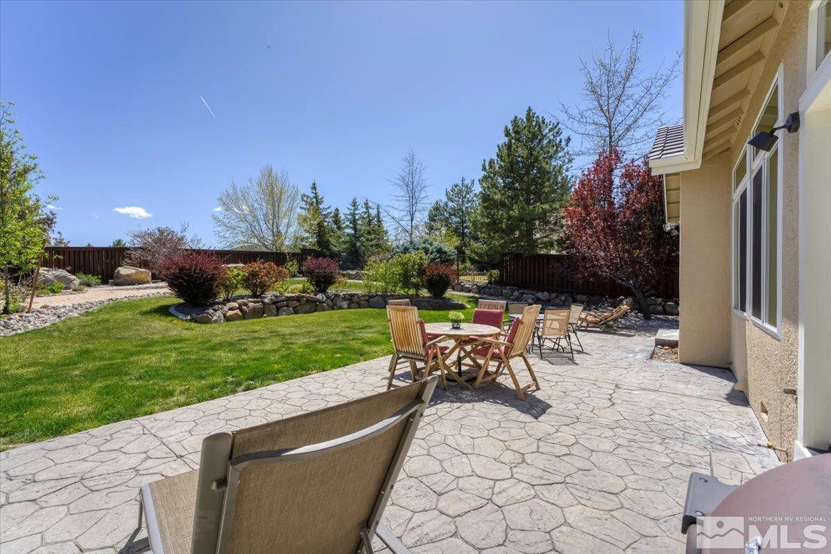 5024 East Albuquerque Road Reno, NV 89511 - Photo 26 of 27 a view of a backyard with sitting area